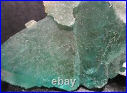 Green Fluorite Coupled with Quartz Crystals, Frosted over Rock